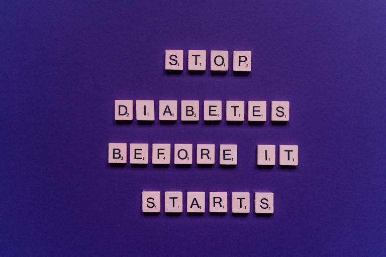 Creative Scrabble tile arrangement advocating diabetes prevention with a vivid purple background.